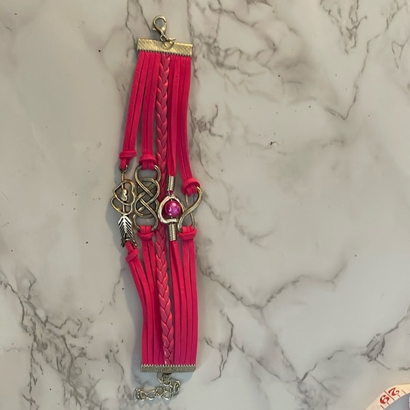 A Hot Pink bracelet with 4 charms - Picture 1 of 4